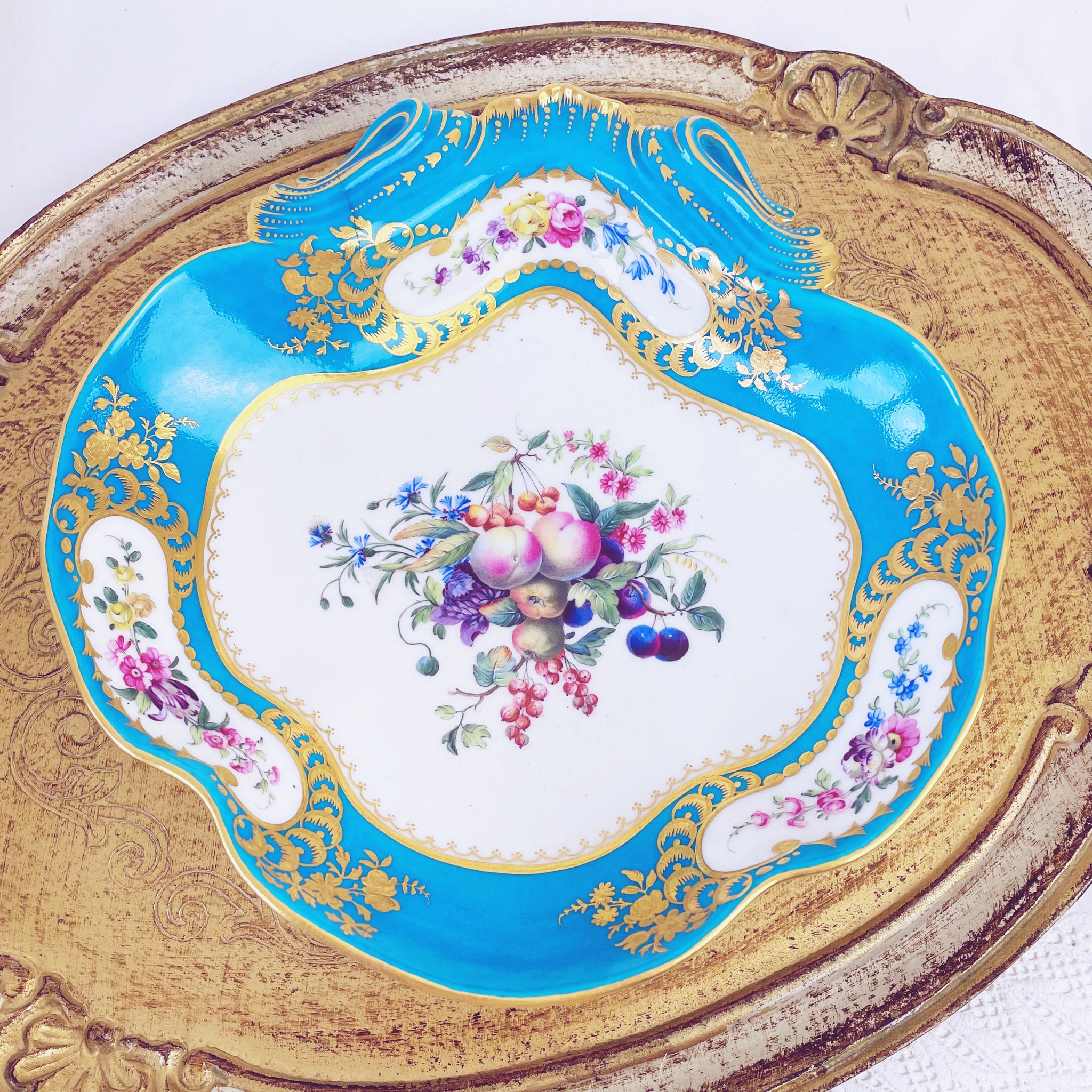 A soft paste Sèvres shell handled serving dish, 22cm.