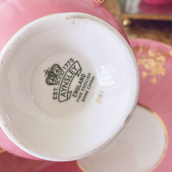 Aynsley crocus shape cup and saucer, pink with purple flowers, vintage cabinet