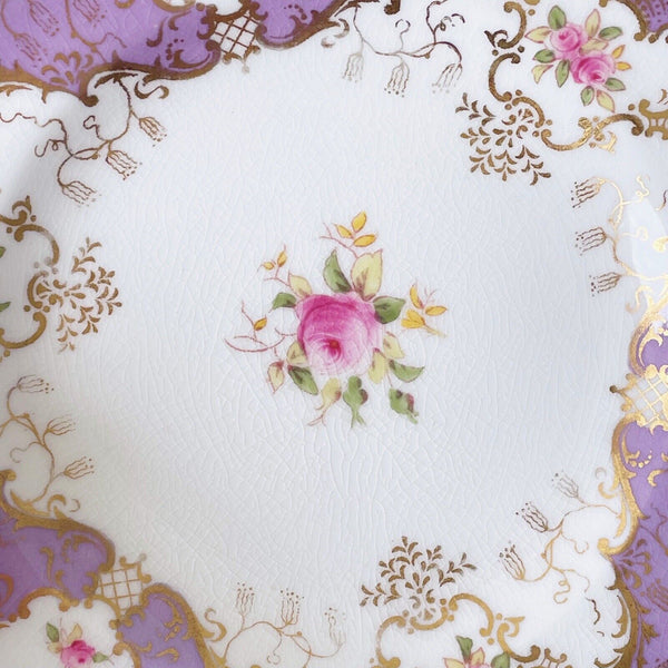 Set of four Coalport tea plates, lilac ground, handpainted cabbage roses