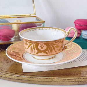 Antique Spode apricot ground teacup and saucer, serpent handle Etruscan shape