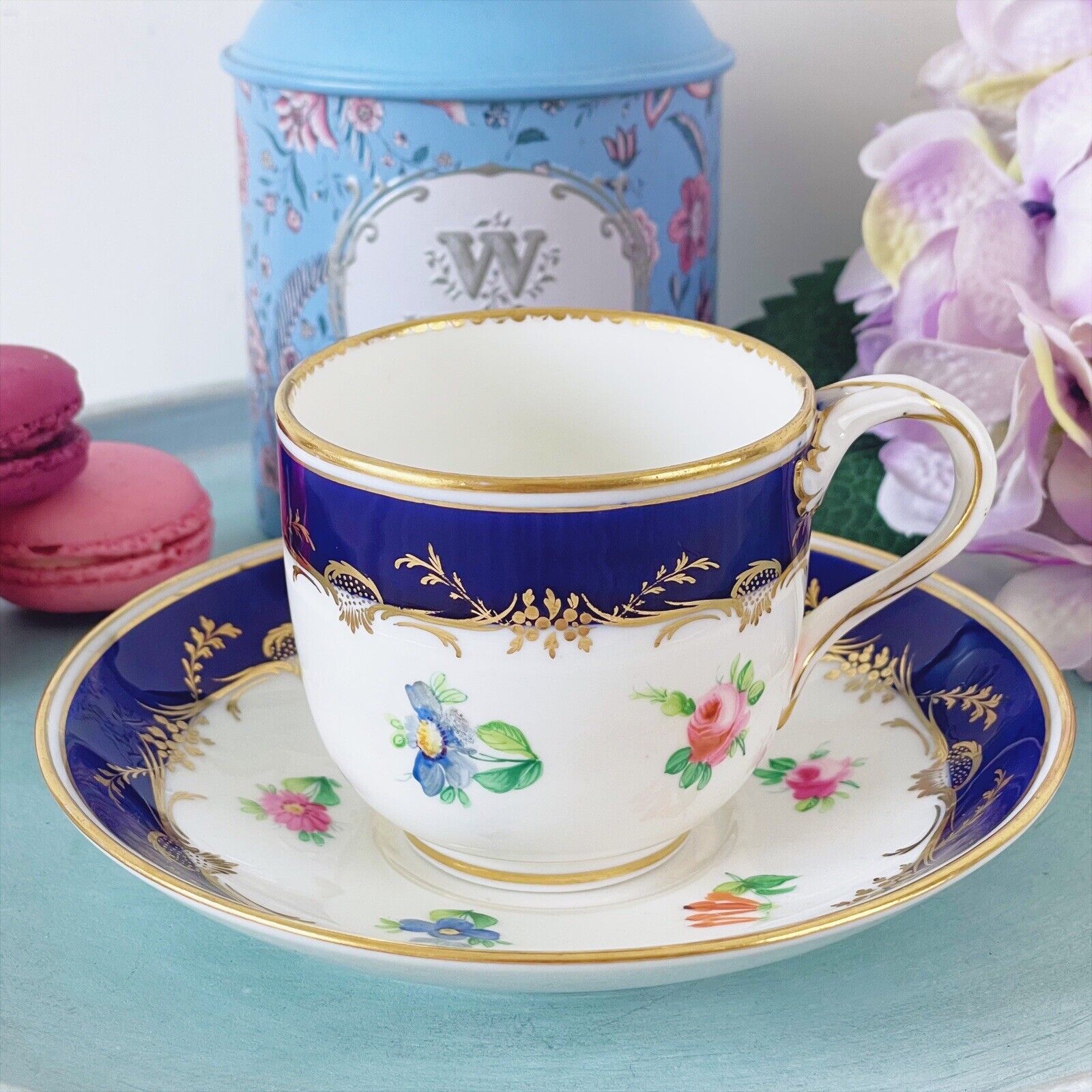 Antique Minton cup and saucer, handpainted flowers, bifurcated split handle 1855