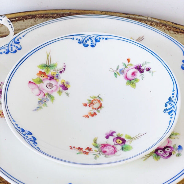 Antique Coalport teacup trio, handpainted flowers and blue edging