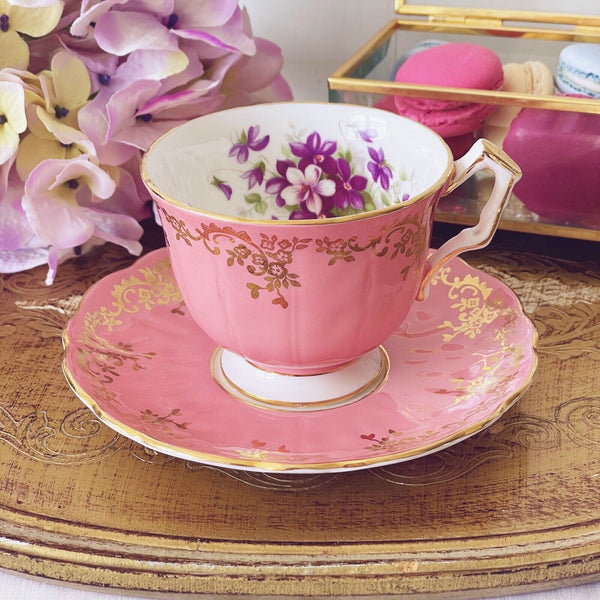 Aynsley crocus shape cup and saucer, pink with purple flowers, vintage cabinet