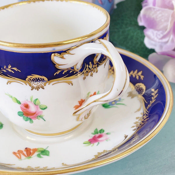 Antique Minton cup and saucer, handpainted flowers, bifurcated split handle 1855