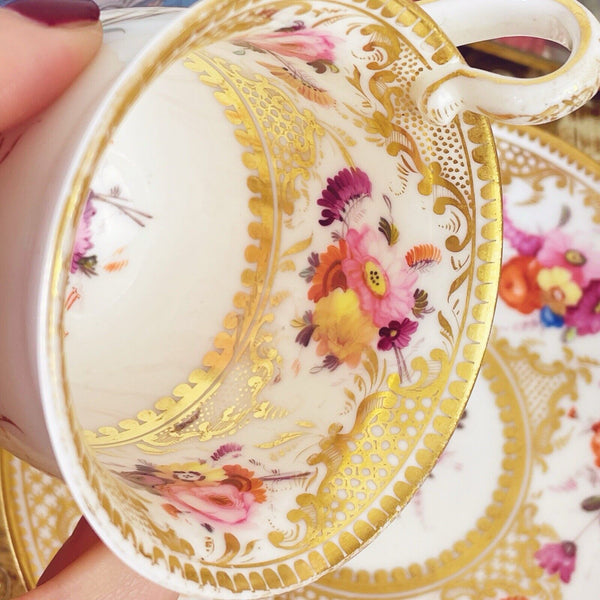 Antique Coalport Empire shape cup and saucer, c1820, handpainted flowers.