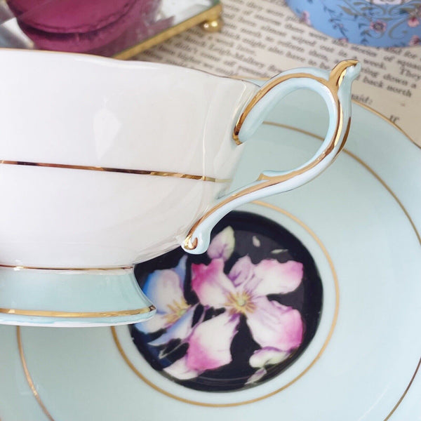 Vintage Paragon cabinet cup & saucer, pink & blue roses, black ground, duck egg