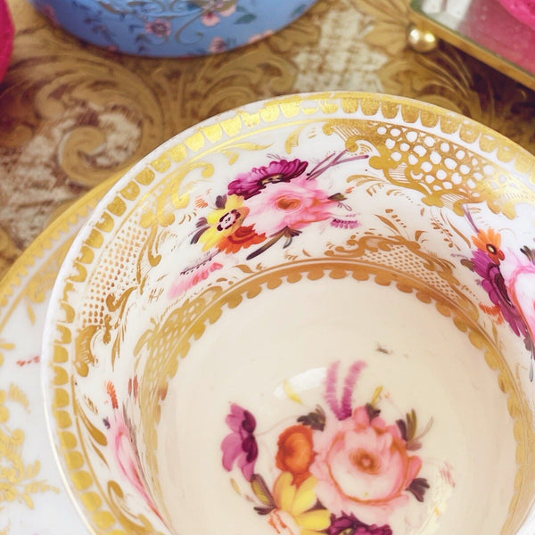 Antique Coalport Empire shape cup and saucer, c1820, handpainted flowers.