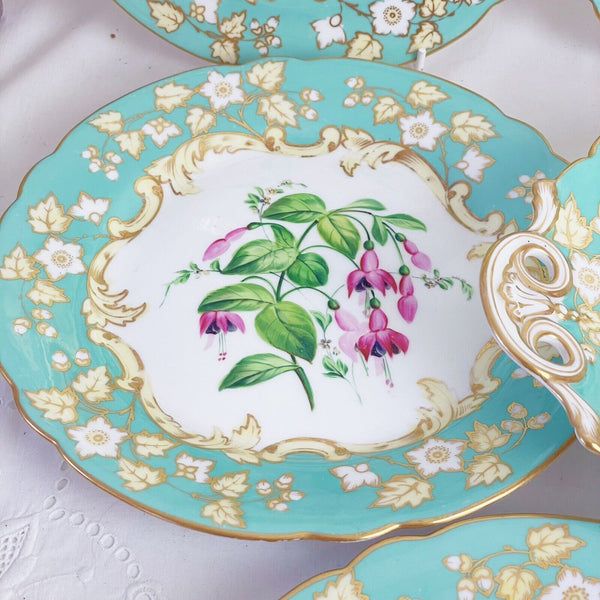 Samuel Alcock dessert service, six plates two comports, turquoise handpainted