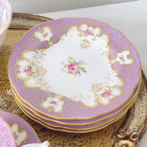 Set of four Coalport tea plates, lilac ground, handpainted cabbage roses