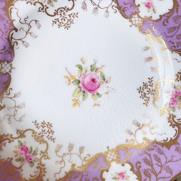 Set of four Coalport tea plates, lilac ground, handpainted cabbage roses