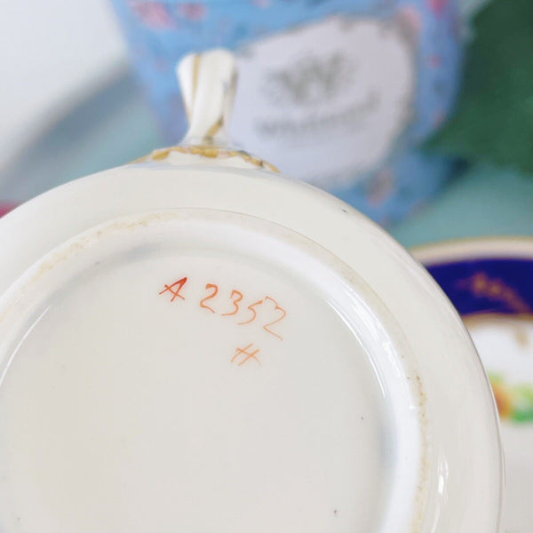 Antique Minton cup and saucer, handpainted flowers, bifurcated split handle 1855