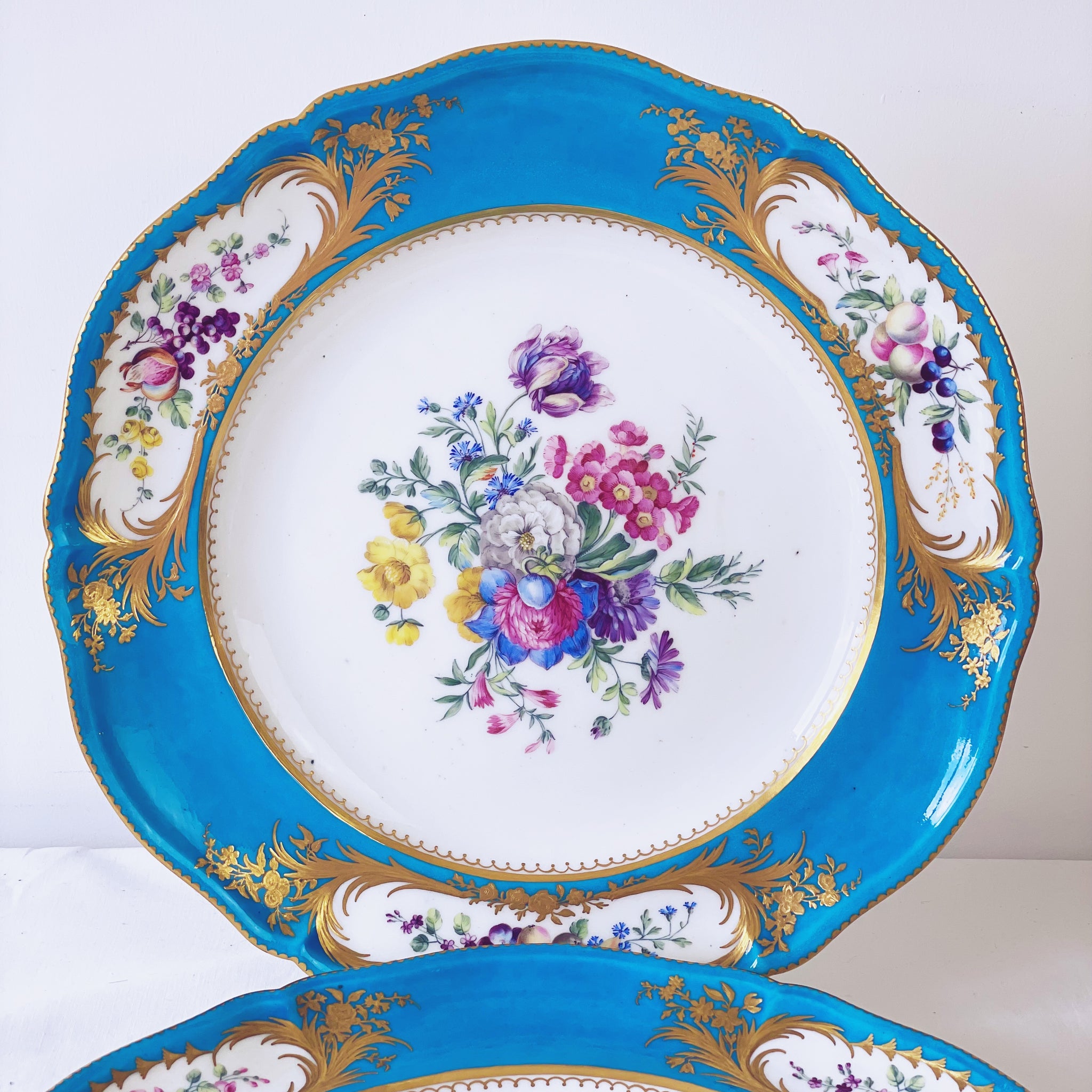 Pair of soft paste Sèvres bleu Celeste charger plates, 29.5cm