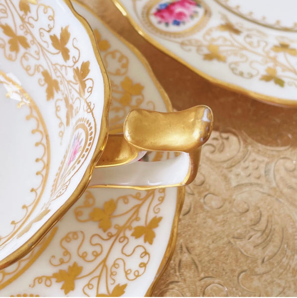 Antique Cauldon teacup trio with gilded vine leaves and pink rose cameos