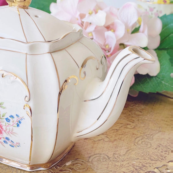 A vintage cube shaped Sadler teapot, full size with pink cabbage rose design