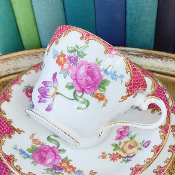Aynsley Wilton in pink vintage teacup trio with flowers