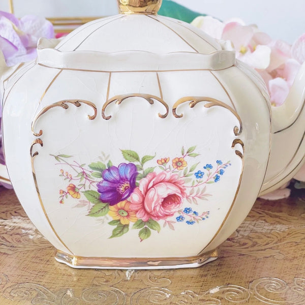 A vintage cube shaped Sadler teapot, full size with pink cabbage rose design