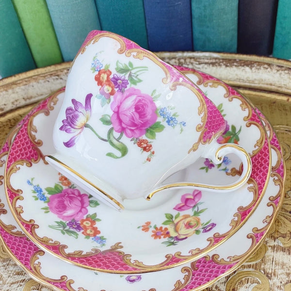 Aynsley Wilton in pink vintage teacup trio with flowers