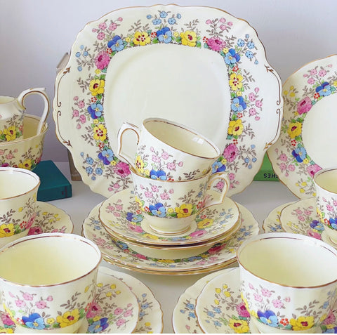 Crown Staffordshire 21 piece pastel tea set, handpainted flowers, lemon yellow