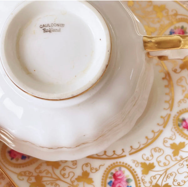 Antique Cauldon teacup trio with gilded vine leaves and pink rose cameos