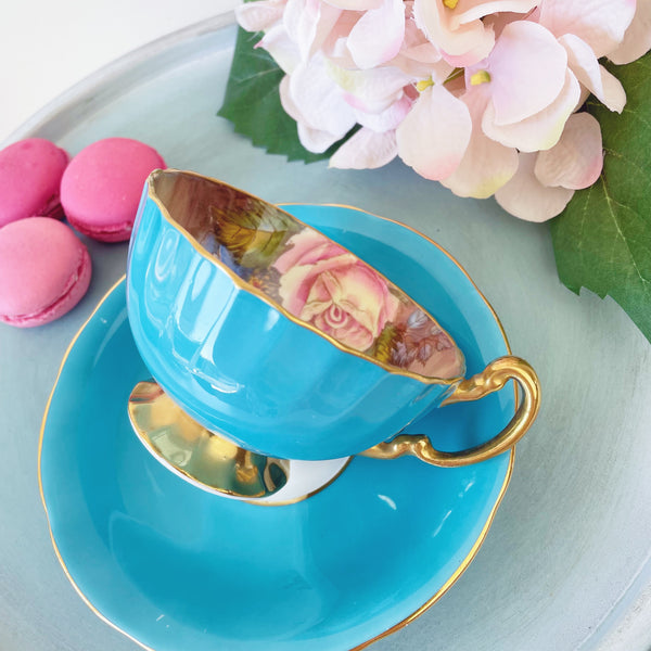 Aynsley J A Bailey cabbage rose teacup cabinet duo, turquoise