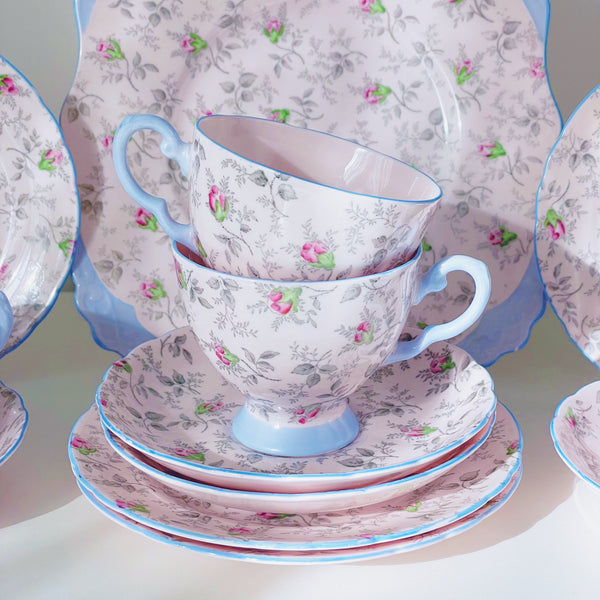 Vintage pink Tuscan rosebud tea set items, blue rim