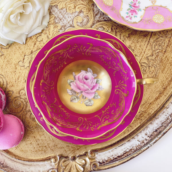 Paragon cabinet cup and saucer duo, cerise pink with floating gold cabbage rose